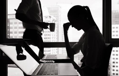 Worried Woman at Laptop