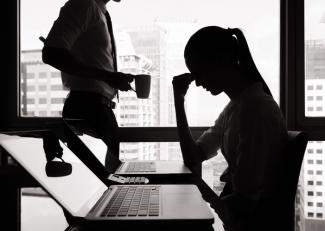 Worried Woman at Laptop